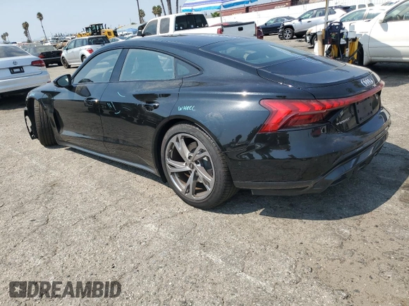 2023 Audi e-tron GT Prestige z VIN WAUDJBFWXP7003055, wystawiony jako Copart lot #71028874 z przebiegiem 7107 mil mil oraz Szkody całkowita. Historia ofert i sprzedaży dostępna na DreamBid. Obrazek 2.