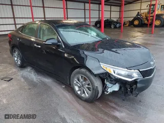2017 Kia Optima LX 1.6T with VIN 5XXGT4L10HG129660, listed as a IAAI auction lot 40887271 with 107,000 mi miles. Bid and sale history available at carsss.com. Image 1.