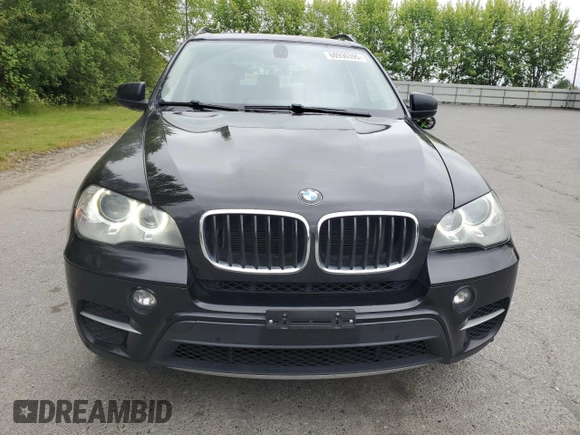 2012 BMW X5 35d with VIN 5UXZW0C54CL671377, listed as a Copart auction lot 60936395 with 105,903 mi miles and Salvage title. Bid and sale history available at DreamBid. Image 5.