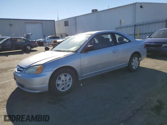 2003 Honda Civic LX with VIN 1HGEM21563L065861, listed as a Copart auction lot 41876845 with 233,101 mi miles and Salvage Title. Bid and sale history available at DreamBid. Image 1.