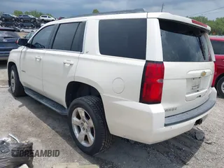 2015 Chevrolet Tahoe LT with VIN 1GNSCBKC0FR739951, listed as a IAAI auction lot 42332982 with 133,046 mi miles and . Bid and sale history available at DreamBid. Image 3.