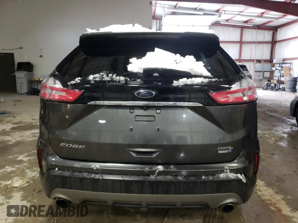 2019 Ford Edge SEL z VIN 2FMPK4J94KBB35458, wystawiony jako Copart lot #44383745 z przebiegiem 184 835 mil mil oraz Szkoda całkowita • Salvage title. Historia ofert i sprzedaży dostępna na DreamBid. Obrazek 6.