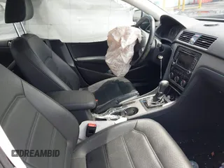 2014 Volkswagen Passat SE with VIN 1VWBT7A32EC070023, listed as a IAAI auction lot 42202567 with 116,438 mi miles and . Bid and sale history available at DreamBid. Image 5.