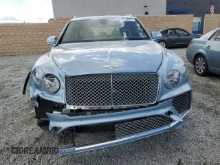 2022 Bentley Bentayga V8 z VIN SJAAM2ZV9NC016403, wystawiony jako Copart lot #51584975 z przebiegiem 4 462 mil mil oraz Szkoda całkowita • Salvage title. Historia ofert i sprzedaży dostępna na DreamBid. Obrazek 5.