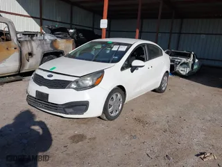 2015 Kia Rio LX with VIN KNADM4A30F6449543, listed as a IAAI auction lot 41583073 with 80,288 mi miles. Bid and sale history available at carsss.com. Image 2.