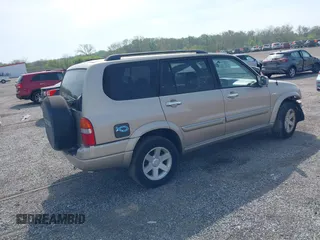 2003 Suzuki XL7 Touring with VIN JS3TX92V634111642, listed as a IAAI auction lot 42096355 with 95,009 mi miles and . Bid and sale history available at DreamBid. Image 4.