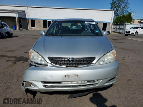 2004 Toyota Camry LE z VIN JTDBE32K640270298, wystawiony jako Copart lot #58800955 z przebiegiem 79 064 mil mil oraz Szkoda całkowita • Salvage title. Historia ofert i sprzedaży dostępna na DreamBid. Obrazek 5.
