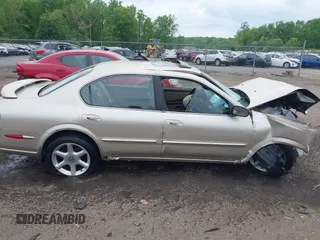 2000 Nissan Maxima GXE z VIN JN1CA31D2YT531324, wystawiony jako IAAI lot #42126970 z przebiegiem 141 864 mil mil oraz . Historia ofert i sprzedaży dostępna na DreamBid. Obrazek 14.