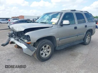 2002 Chevrolet Tahoe LS z VIN 1GNEC13V22R206341, wystawiony jako IAAI lot #42436560 z przebiegiem 271 904 mil mil oraz . Historia ofert i sprzedaży dostępna na DreamBid. Obrazek 2.