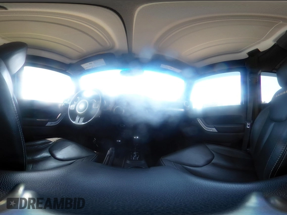 2014 Jeep Wrangler Unlimited Sahara with VIN 1C4BJWEG0EL273086, listed as a IAAI auction lot 42340938 with 121,448 mi miles and . Bid and sale history available at DreamBid. Image 18.