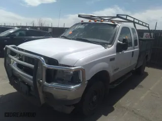 2002 Ford Super Duty F-350 SRW XL with VIN 1FTSX31F32ED01005, listed as a IAAI auction lot 32993712 with 395,252 mi miles. Bid and sale history available at carsss.com. Image 2.