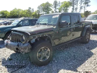 2022 Jeep Gladiator Rubicon z VIN 1C6JJTBGXNL130958, wystawiony jako Copart lot #52515165 z przebiegiem 62 152 mil mil oraz Szkoda całkowita • Salvage title. Historia ofert i sprzedaży dostępna na DreamBid. Obrazek 1.
