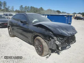 2018 Maserati Levante S GranSport z VIN ZN661YUS6JX297381, wystawiony jako Copart lot #75981804 z przebiegiem Nie podano mil oraz Szkoda całkowita • Salvage title. Historia ofert i sprzedaży dostępna na DreamBid. Obrazek 4.