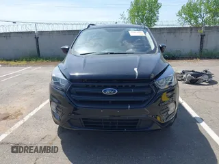 2019 Ford Escape SE with VIN 1FMCU0GD4KUB29621, listed as a IAAI auction lot 42062095 with 137,807 mi miles. Bid and sale history available at carsss.com. Image 13.