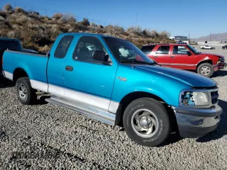 1997 Ford F-150 with VIN 1FTDX1725VKC16240, listed as a Copart auction lot 80091964 with 115,205 mi miles and Salvage title. Bid and sale history available at DreamBid. Image 4.