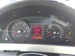 2008 Pontiac G8 with VIN 6G2ER57798L988697, listed as a IAAI auction lot 41690384 with 166,798 mi miles. Bid and sale history available at carsss.com. Image 7.