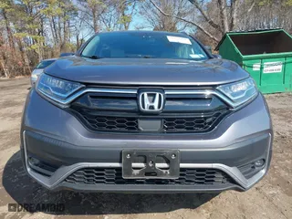 2021 Honda CR-V Touring with VIN 2HKRW2H9XMH645901, listed as a IAAI auction lot 41870446 with 22,996 mi miles. Bid and sale history available at carsss.com. Image 13.