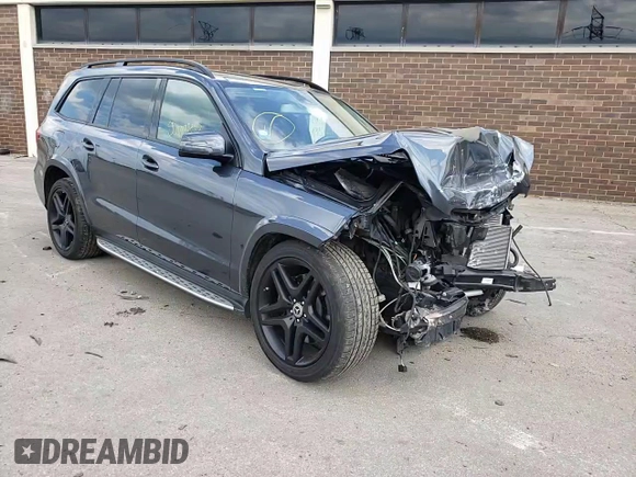 2015 Mercedes-Benz GL-Class GL 550 with VIN 4JGDF7DE7FA561521, listed as a Copart auction lot 56681512 with 67,329 mi miles. Bid and sale history available at carsss.com. Image 11.