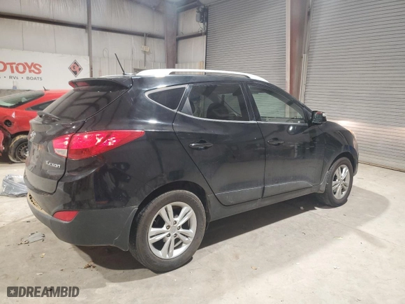 2013 Hyundai Tucson GLS with VIN KM8JU3AC7DU722174, listed as a Copart auction lot 44591885 with 115,263 mi miles and Salvage Title. Bid and sale history available at carsss.com. Image 3.