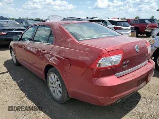 2006 Mercury Milan with VIN 3MEFM07156R603787, listed as a Copart auction lot 63317745 with 83,704 mi miles and Salvage title. Bid and sale history available at DreamBid. Image 2.