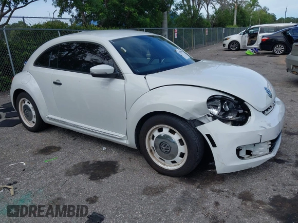 2015 Volkswagen Beetle Fleet Edition with VIN 3VWF17AT2FM656714, listed as a IAAI auction lot 42698040 with 72,348 mi miles and . Bid and sale history available at DreamBid. Image 1.