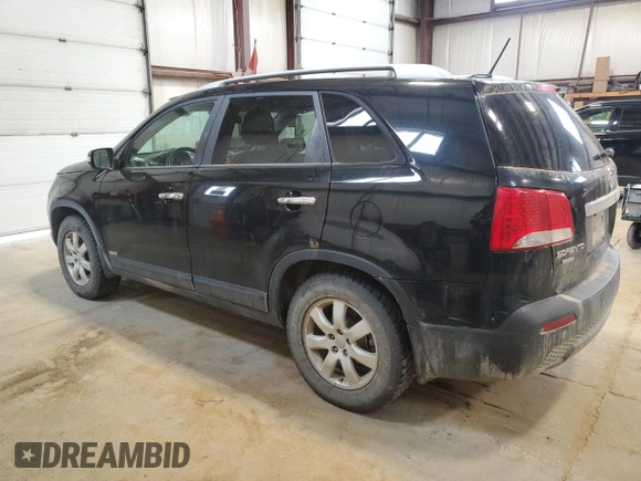 2012 Kia Sorento LX z VIN 5XYKTCA62CG209291, wystawiony jako Copart lot #57133005 z przebiegiem 423 888 mil mil oraz Czysty tytuł • Clean title. Historia ofert i sprzedaży dostępna na DreamBid. Obrazek 2.