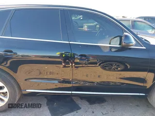 2014 Audi Q5 Premium Plus z VIN WA1LFAFP9EA130988, wystawiony jako IAAI lot #41835596 z przebiegiem 91 303 mil mil oraz . Historia ofert i sprzedaży dostępna na DreamBid. Obrazek 13.