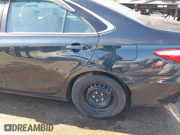 2015 Toyota Camry LE z VIN 4T1BD1FK8FU172673, wystawiony jako IAAI lot #41780228 z przebiegiem 171 308 mil mil oraz . Historia ofert i sprzedaży dostępna na DreamBid. Obrazek 19.