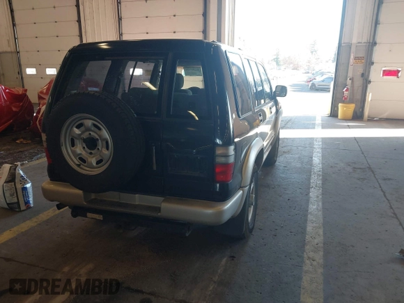2001 Isuzu Trooper S with VIN JACDJ58X917J09299, listed as a IAAI auction lot 41296724 with 131,829 mi miles and . Bid and sale history available at DreamBid. Image 4.
