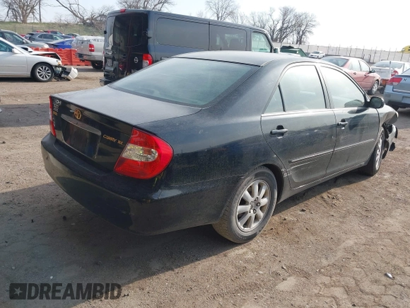 2003 Toyota Camry LE with VIN 4T1BE32K33U176270, listed as a IAAI auction lot 41995146 with 223,032 mi miles and . Bid and sale history available at DreamBid. Image 4.