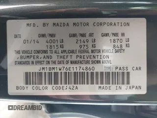 2014 Mazda 3 i Grand Touring with VIN JM1BM1W76E1174860, listed as a IAAI auction lot 42095053 with 44,727 mi miles and . Bid and sale history available at DreamBid. Image 9.