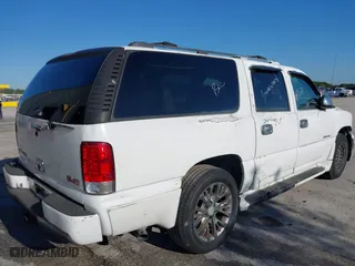 2006 GMC Yukon XL Denali with VIN 1GKFK66U56J142191, listed as a IAAI auction lot 41862921 with 147,655 mi miles. Bid and sale history available at carsss.com. Image 4.