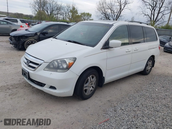 2007 Honda Odyssey EX-L with VIN 5FNRL38607B403903, listed as a IAAI auction lot 42074718 with 148,816 mi miles. Bid and sale history available at carsss.com. Image 2.