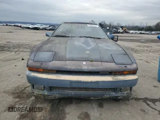 1986 Toyota Supra z VIN JT2MA70L5G0019616, wystawiony jako Copart lot #85307554 z przebiegiem 33 961 mil mil oraz Czysty tytuł • Clean title. Historia ofert i sprzedaży dostępna na DreamBid. Obrazek 5.