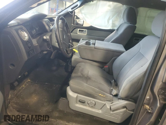 2011 Ford F-150 XL with VIN 1FTFW1CF3BFA90954, listed as a Copart auction lot 60242655 with 195,584 mi miles and Salvage title. Bid and sale history available at DreamBid. Image 7.