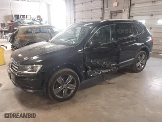 2020 Volkswagen Tiguan SE with VIN 3VV2B7AX4LM115131, listed as a IAAI auction lot 42017352 with 87,909 mi miles. Bid and sale history available at carsss.com. Image 17.