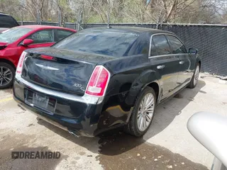 2012 Chrysler 300 with VIN 2C3CCAET1CH284661, listed as a IAAI auction lot 41920717 with 123,505 mi miles. Bid and sale history available at carsss.com. Image 4.