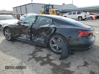 2023 Audi e-tron GT Premium Plus z VIN WAUFJBFWXP7003131, wystawiony jako Copart lot #38763864 z przebiegiem 16 636 mil mil oraz . Historia ofert i sprzedaży dostępna na DreamBid. Obrazek 2.