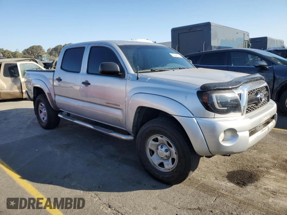 2011 Toyota Tacoma PreRunner with VIN 3TMJU4GN9BM118078, listed as a Copart auction lot 73394074 with 168,574 mi miles and Salvage Title. Bid and sale history available at DreamBid. Image 4.