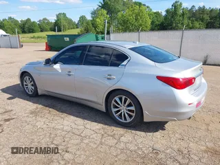 2015 Infiniti Q50 Premium z VIN JN1BV7AP1FM346254, wystawiony jako IAAI lot #42147947 z przebiegiem 147 737 mil mil oraz . Historia ofert i sprzedaży dostępna na DreamBid. Obrazek 3.
