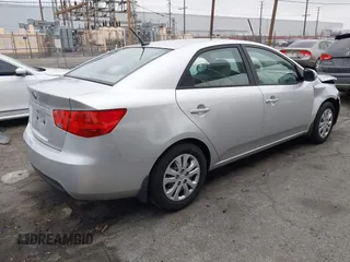 2013 Kia Forte LX with VIN KNAFT4A21D5739585, listed as a IAAI auction lot 42097213 with 195,500 mi miles. Bid and sale history available at carsss.com. Image 4.