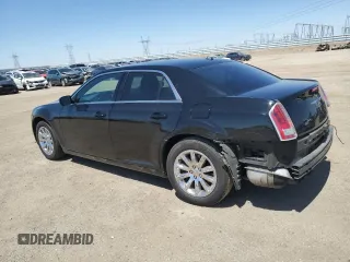 2014 Chrysler 300 with VIN 2C3CCAAG8EH307087, listed as a Copart auction lot 54091345 with 217,869 mi miles and Salvage Title. Bid and sale history available at DreamBid. Image 2.