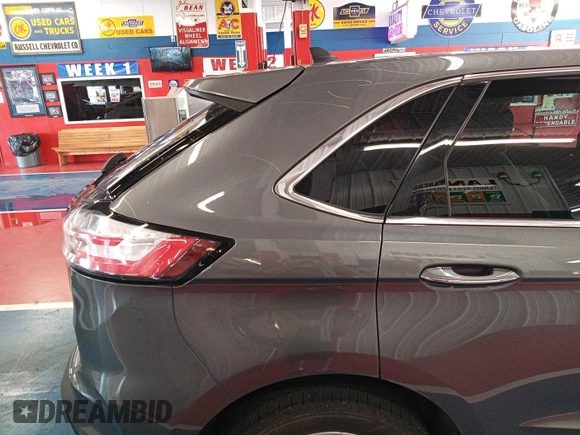 2021 Ford Edge Titanium with VIN 2FMPK4K95MBA50355, listed as a IAAI auction lot 42821253 with 109,191 mi miles and . Bid and sale history available at DreamBid. Image 15.