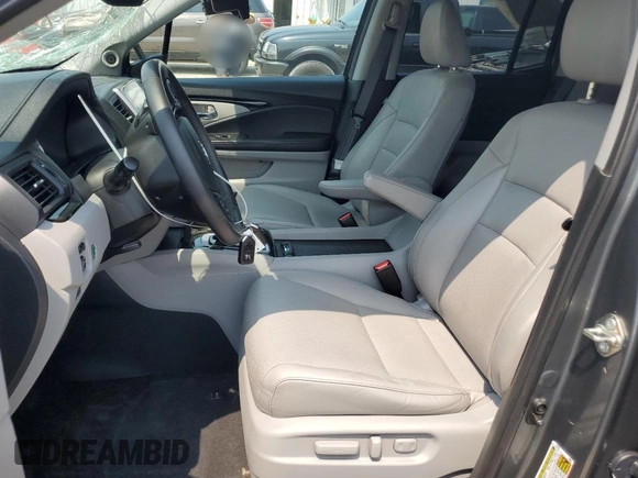 2017 Honda Ridgeline RTL-E with VIN 5FPYK3F74HB039715, listed as a Copart auction lot 60271415 with 56,892 mi miles and Salvage title. Bid and sale history available at DreamBid. Image 7.