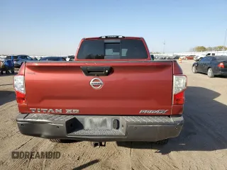 2016 Nissan Titan XD PRO-4X with VIN 1N6BA1F43GN512559, listed as a Copart auction lot 82991154 with 0 mi miles and Salvage Title. Bid and sale history available at carsss.com. Image 6.