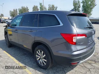 2020 Honda Pilot EX-L z VIN 5FNYF6H50LB047202, wystawiony jako IAAI lot #42117776 z przebiegiem 119 726 mil mil oraz . Historia ofert i sprzedaży dostępna na DreamBid. Obrazek 3.