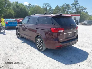 2015 Kia Sedona EX with VIN KNDMC5C19F6018139, listed as a IAAI auction lot 42031165 with 136,484 mi miles. Bid and sale history available at carsss.com. Image 3.