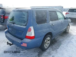 2007 Subaru Forester X with VIN JF1SG63697G718015, listed as a IAAI auction lot 41560187 with 209,572 mi miles. Bid and sale history available at carsss.com. Image 4.