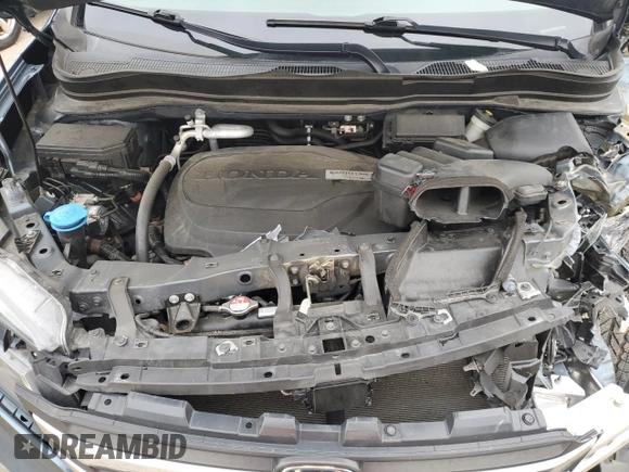 2018 Honda Pilot EX-L с VIN 5FNYF5H64JB019287, выставлен на аукционе Copart как лот 46041724 с пробегом Не указан миль и Списание • Salvage title. История ставок и продаж доступна на DreamBid. Изображение 12.