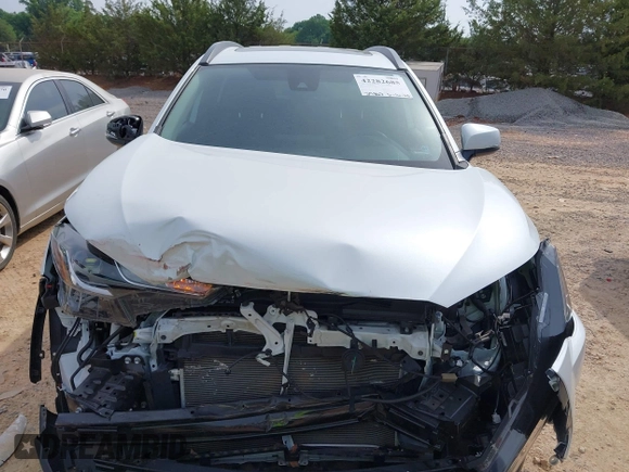 2022 Toyota Corolla Cross LE with VIN 7MUBAAAG6NV021369, listed as a IAAI auction lot 42282685 with 37,863 mi miles and . Bid and sale history available at DreamBid. Image 12.